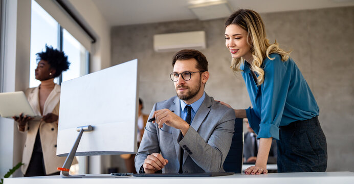 Business professionals explores artificial intelligence, machine learning, and data analytics - Powered by Adobe