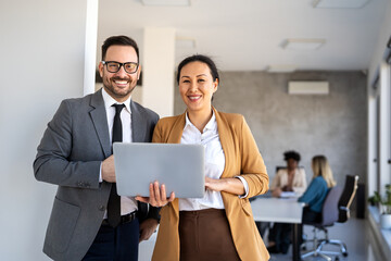 Mixed team of software engineers brainstorming ideas. Diverse app developers collaborating as group