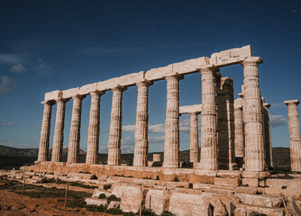 Obraz premium Temple of Poseidon – perspective columns, Ancient Columns of the Temple of Poseidon, Cape Sounion Greece