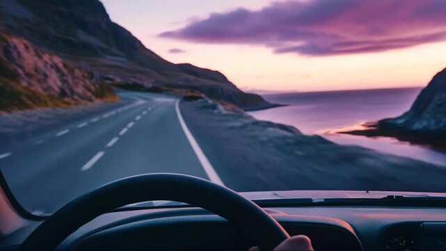 Driving along a coastal road at sunset near a steep mountain in Norway, capturing the scenic views of land and sea