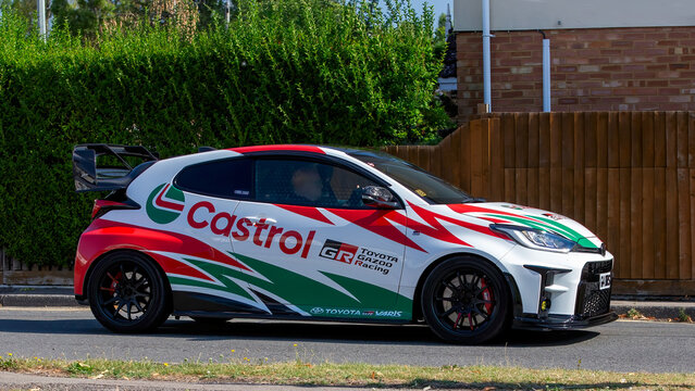 Bletchley,Bucks,UK - Aug 25th 2025:  2011 Vauxhall Corsa sxi car in Castrol colours driving on a British road