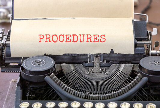 Procedures symbol. Concept word Procedures typed on beautiful old retro typewriter. Beautiful white paper background. Business procedures concept. Copy space.