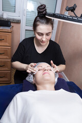 Experienced Beautician Applying Eye Patches, Facial Treatment Session