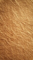 Natural fibers create a textured background showcasing shades of brown and gold in a close-up view of the material