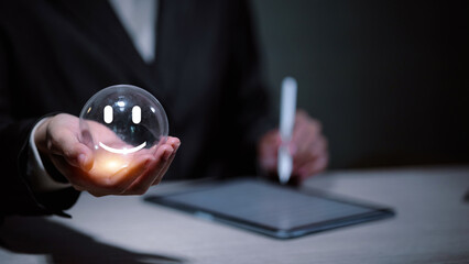 Businessman holding glass ball with glowing smiley face icon for customer satisfaction.