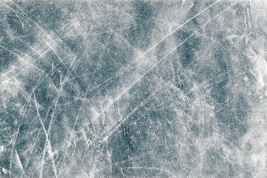 Scratched ice surface effect background. Abstract frozen water grunge texture.