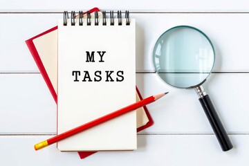 MY TASKS text on notebook on a white wooden background , business concept.