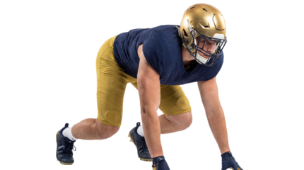 American football player in ready stance on transparent background