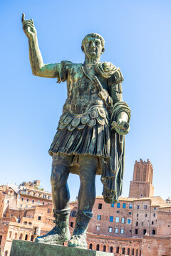 Italy, Rome - July 12, 2025: Emperor Trajan Statue in Rome Italy monument. Ancient Italian leadership sculpture