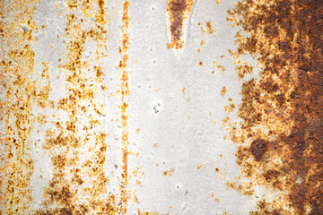 Textured Surface of Rusty Metal with Orange and Brown Corrosion