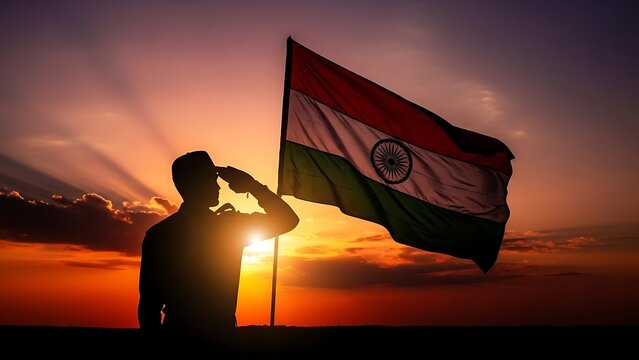 Silhouette of a proud individual saluting the vibrant Indian national flag against a breathtaking orange and red sunset sky, symbolizing honor and national pride and devotion