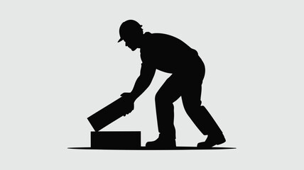 Construction worker pouring cement into foundation