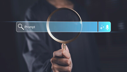 Holding magnifying glass with search bar showing the word Prompt, representing AI-powered search optimization, prompt engineering, and digital keyword targeting technology.