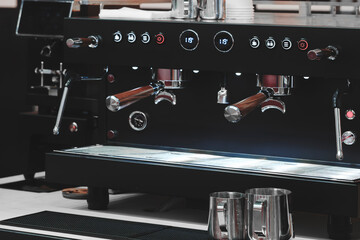 Modern coffee maker coffee machine in the bar with a digital display for making multiple cups of coffee