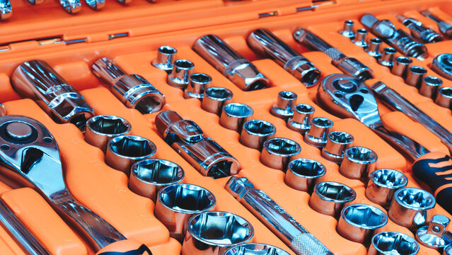 A toolbox with many different tools in it. There are many different sizes and shapes of tools