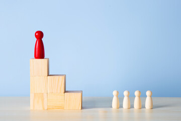 Red leader standing on top of success ladder