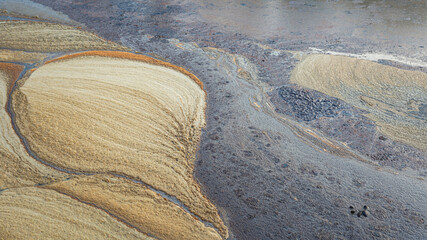 Contaminated sewage dirty fluid mix with chemical or crude oil, it floating on water surface at...