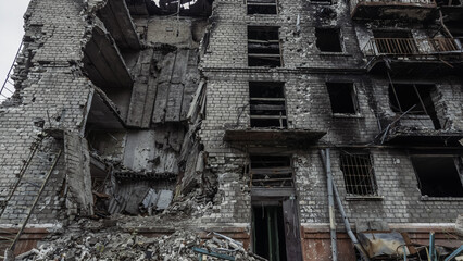 ruined street and destroyed houses the city Kiev war in Ukraine