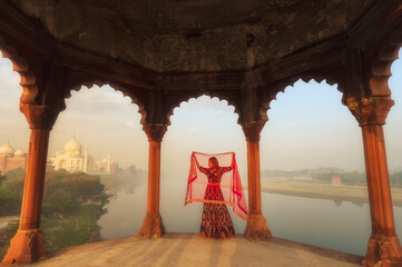 Woman in sari at Taj Mahal, India,