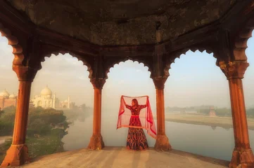 Woman in sari at Taj Mahal, India, © saravut