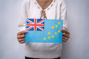Hands Holding National Flag of Tuvalu
