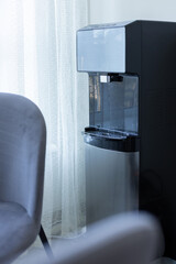 Water cooler on a kitchen or office room.