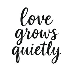 Fototapeta premium Love grows quietly: a beautiful and profound message captured in elegant script isolated on white background