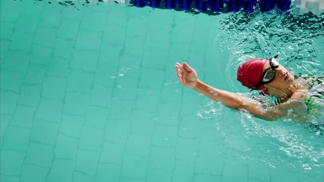Captivating Water Reflections: A Journey Through the Tranquil Surface of a Swimming Pool with Rippling Waves and Gentle Bubbles