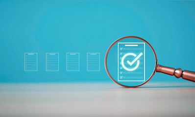 Document verification and audit concept with magnifying glass focusing on checklist for compliance review of quality control, inspection process, approval workflow and business risk management.