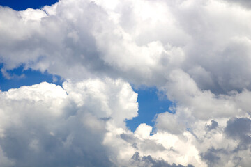 A big white cloud in the blue sky