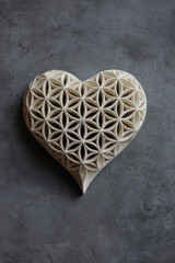 heart of harmony made of flower of life pattern in white color on dark background, mindful love, esoteric passion, romance, romantic, luxury, photorealistic