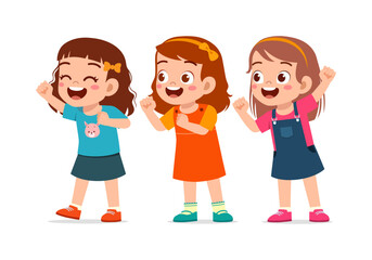 Three happy Asian girls smiling cheerfully with raised hands expressing joy in a playful pose