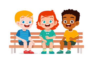 Three happy diverse children smiling cheerful while sitting together on a wooden bench