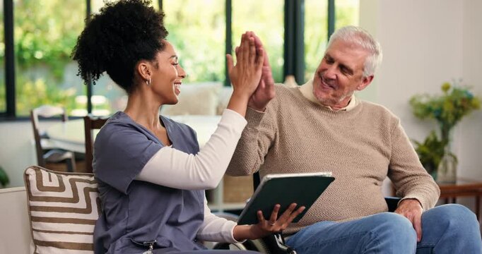 Caregiver, tablet and high five with old man, homecare and people with test results and achievement. Happy, senior patient and nurse with tech for medical report, success and celebration for recovery
