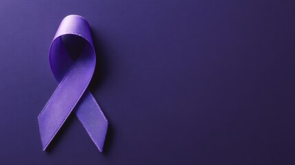 A close-up of a satin purple ribbon tied in a loop against a dark purple background