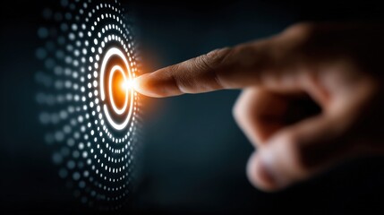 A hand touches a glowing target on a dark background with circular patterns