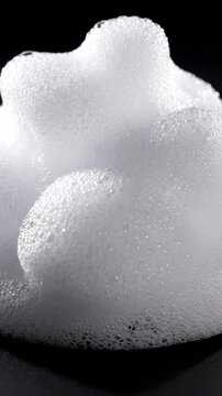 Soap foam creation process from detergent mixed with water in a controlled environment