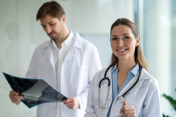 Fototapeta premium Doctors looking at the xray results and looking interested