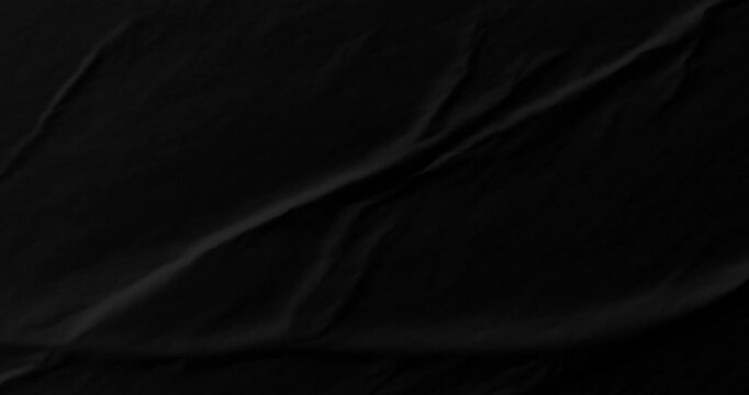 Black glued creased paper background video. High-quality 4K backgrounds are perfect for a variety of creative projects. 