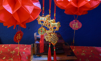 Chineses new  year  celebrations  year  of the  horses  waving  cat 