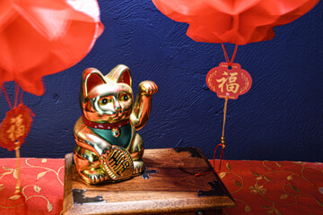 Chineses new  year  celebrations  year  of the  horses  waving  cat 