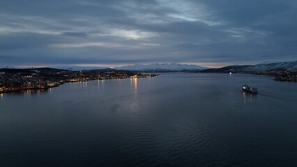 Fototapeta premium Beautiful drone picture of the coastline of Tromsø, during a lovely spring evening, in the Arctic circle, Norway