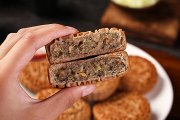 Fototapeta premium Traditional Buckwheat Mooncake - Old-Fashioned Handmade Autumn Festival Pastry