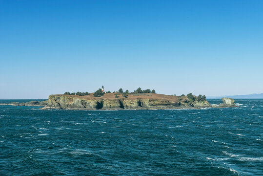 Tatoosh Island, the northwestern tip of the continental United States, a lighthouse.