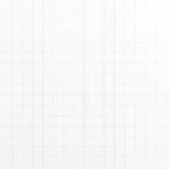 A textured white wall featuring a modern design of interlocking squares and clean lines, creating a visually striking geometric pattern.