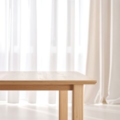 A rustic wooden table sits in the foreground, complemented by soft, flowing white curtains gently billowing in the background, creating a serene atmosphere.
