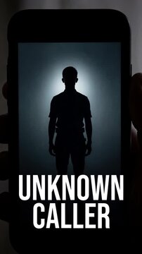 Smartphone screen displaying unknown caller notification with blurred male silhouette. Cyber security and privacy concept. Static close-up shot.
