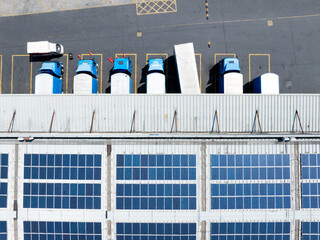 Overlooking warehouses and container trucks