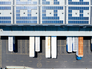 Overlooking warehouses and container trucks