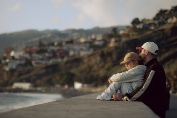 Fototapeta premium father and daughter on the shore of the Atlantic Ocean